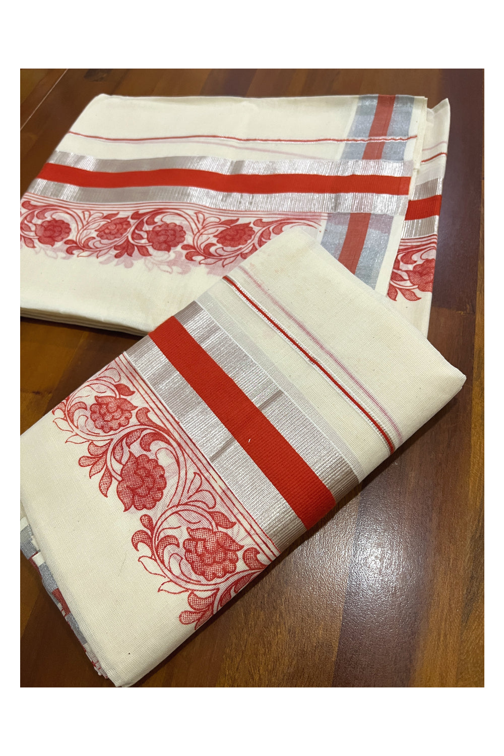 Pure Cotton Single Set Mundu (Mundum Neriyathum ) with Silver Kasavu and Orange Floral Block Prints 2.80 Mtrs