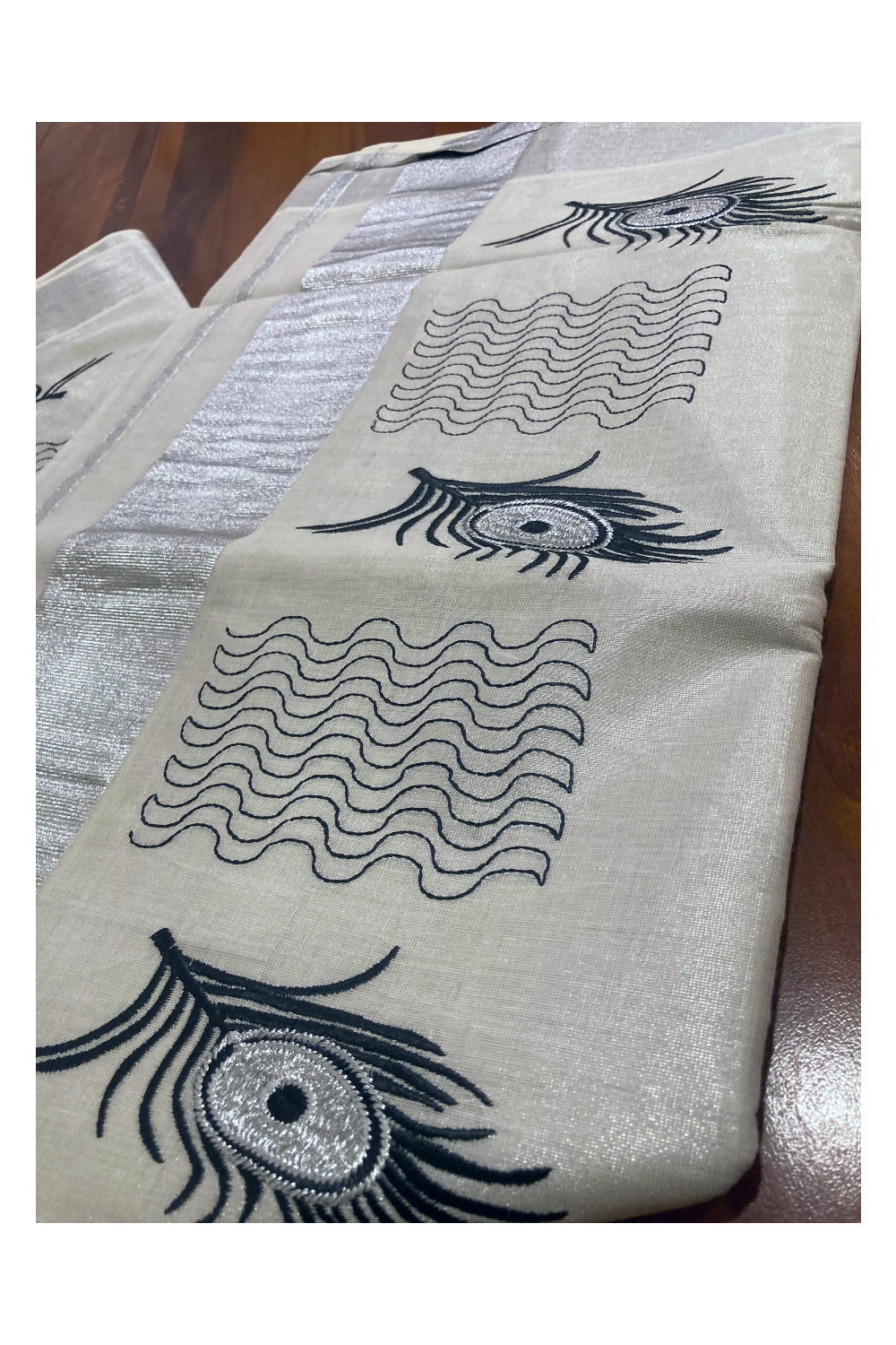 Kerala Silver Tissue Kasavu Saree with Black Embroidery Works