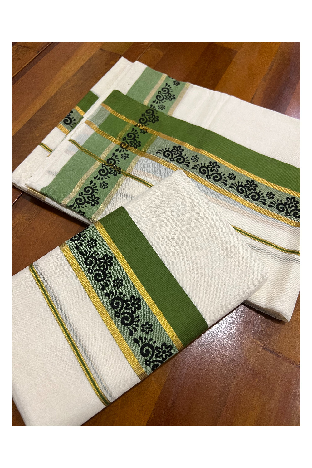 Kerala Cotton Kasavu Set Mundu (Mundum Neriyathum) with Black Floral Block Prints in Green Border