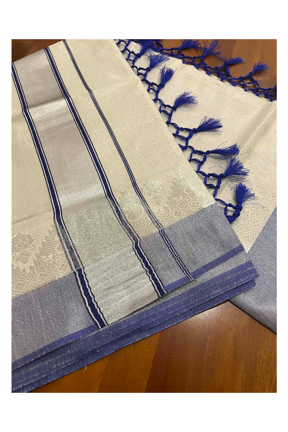 Kerala Silver Tissue Plain Saree with Blue and Silver Border