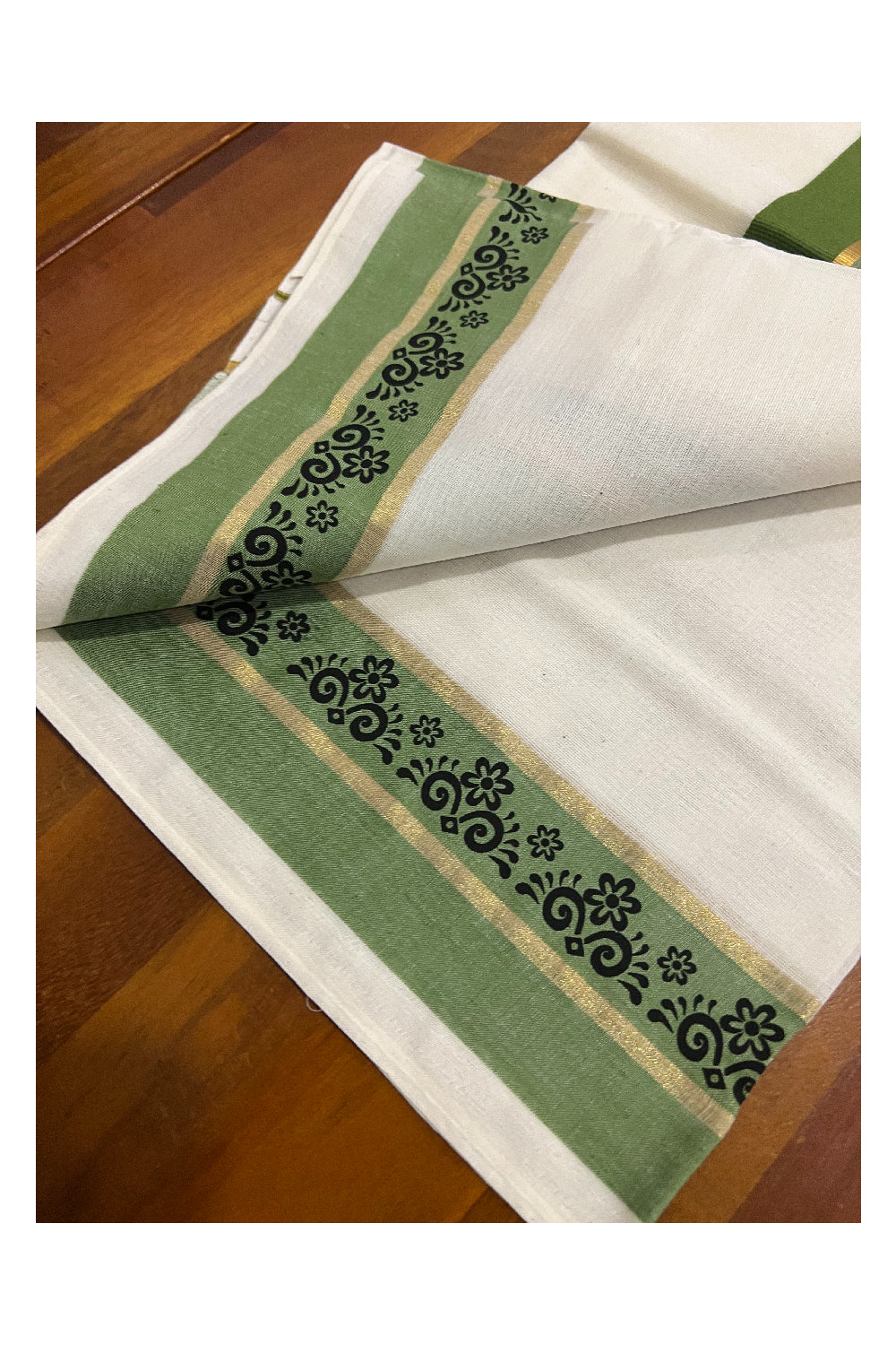 Kerala Cotton Kasavu Set Mundu (Mundum Neriyathum) with Black Floral Block Prints in Green Border