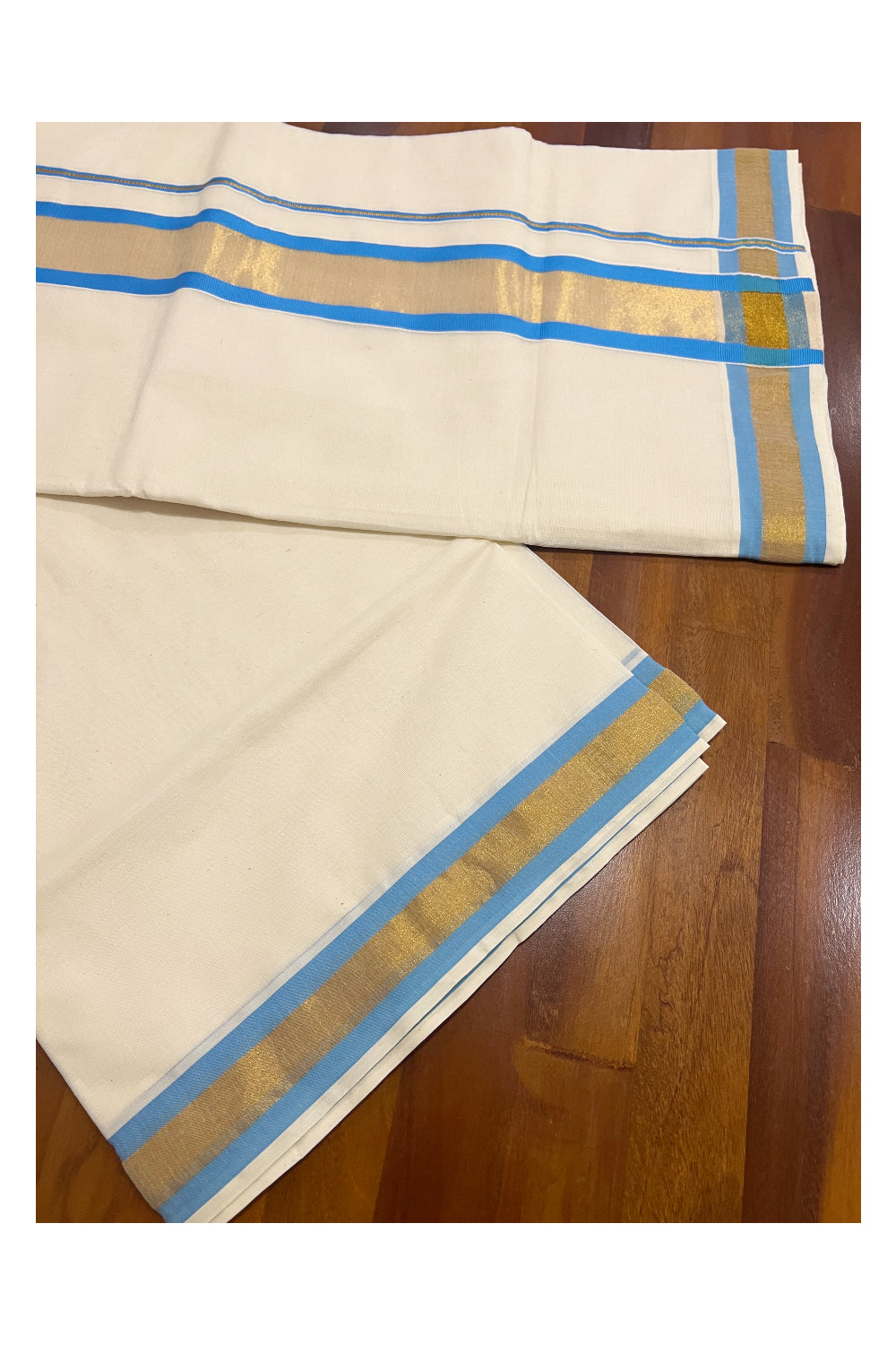 Pure Cotton Kerala Plain Saree with Kasavu and Light Blue Border