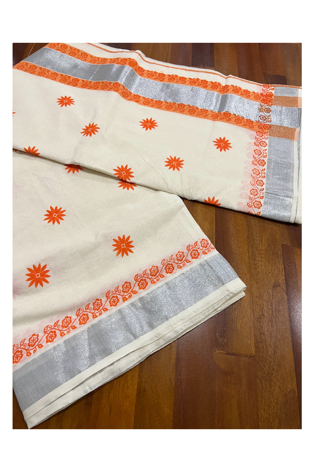 Pure Cotton Kerala Saree with Orange Block Printed Floral Design and Silver Kasavu Border