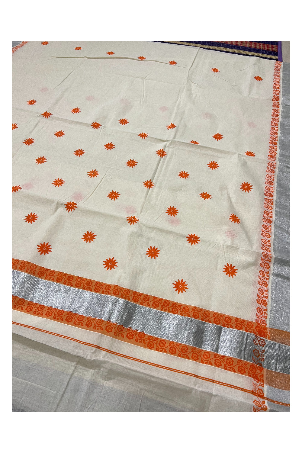 Pure Cotton Kerala Saree with Orange Block Printed Floral Design and Silver Kasavu Border