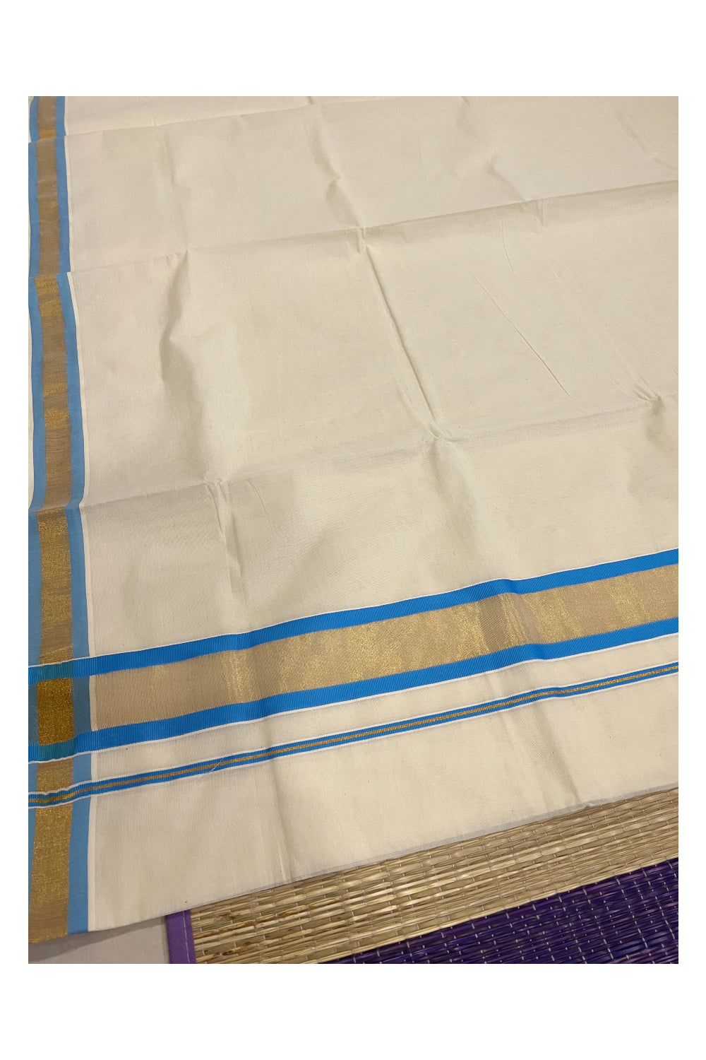 Pure Cotton Kerala Plain Saree with Kasavu and Light Blue Border