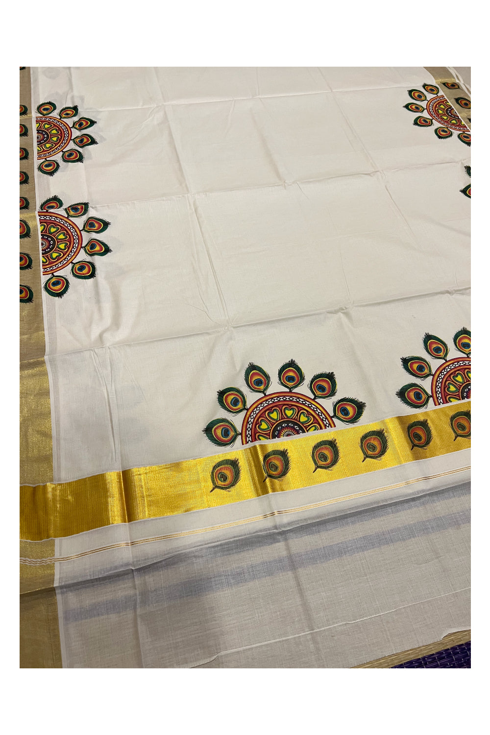 Pure Cotton Kerala Kasavu Saree with Mural Printed Feather Semi Circle Design