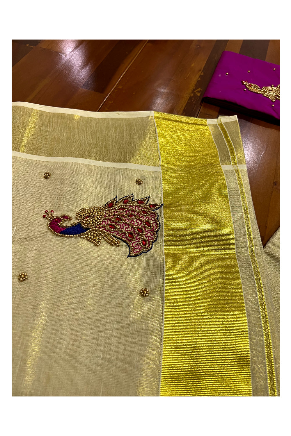 Kerala Tissue Kasavu Saree with Peacock Themed Bead Work Design and Magenta Blouse Piece