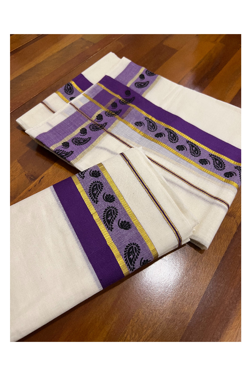 Kerala Cotton Kasavu Set Mundu (Mundum Neriyathum) with Black Floral Block Prints in Purple Border