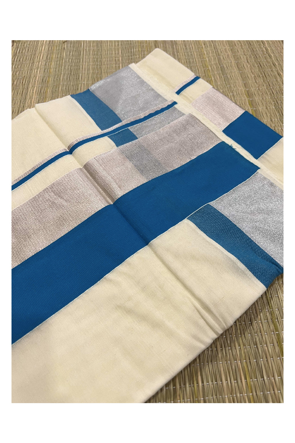 Pure Cotton Off White Kerala Saree with Silver Kasavu and Light Blue Border