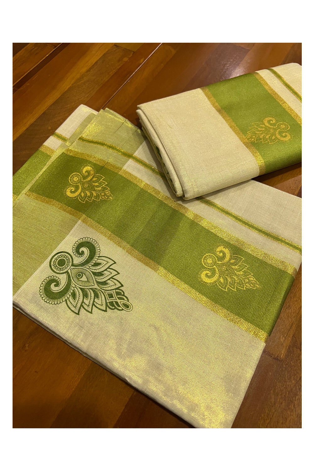 Kerala Tissue Kasavu Set Mundu (Mundum Neriyathum) with Golden and Light Green Block Prints and Tassels