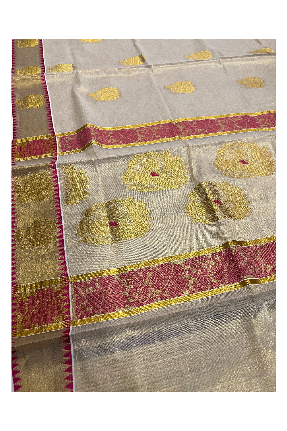 Kerala Tissue Kasavu Saree with Peacock Woven Heavy Work Design and Temple Border