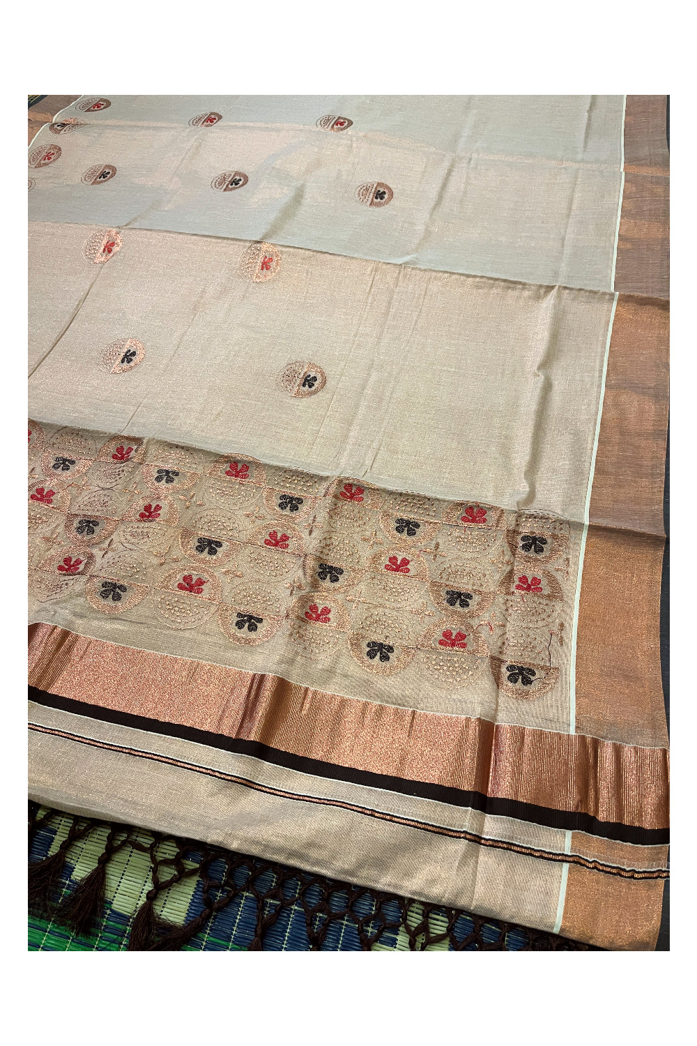 Southloom Copper Tissue Kasavu Saree with Embroidery Design and Brown Tassels Works on Pallu