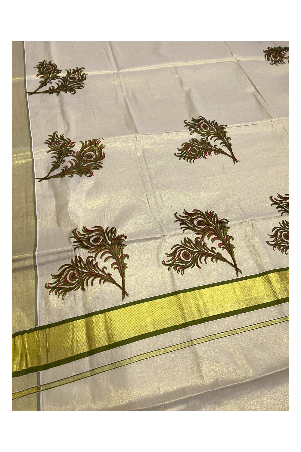 Kerala Tissue Kasavu Saree With Olive Green Peacock Feather Mural Design