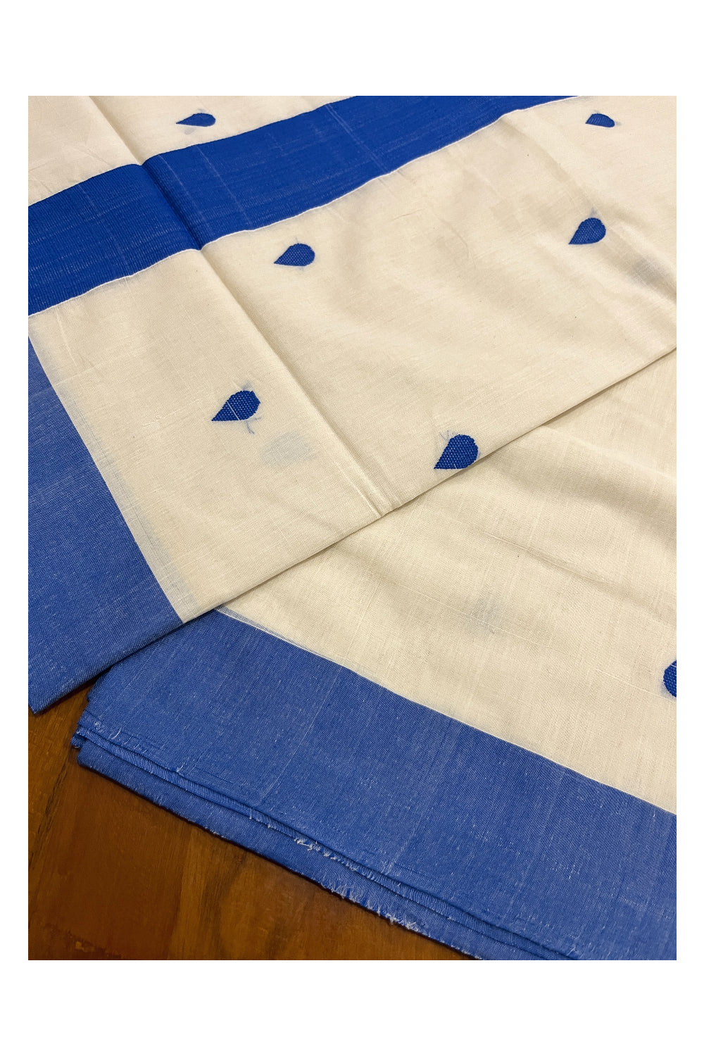 Southloom Balaramapuram Unakkupaavu Handloom Saree with Blue Pallu and Butta Works on Body