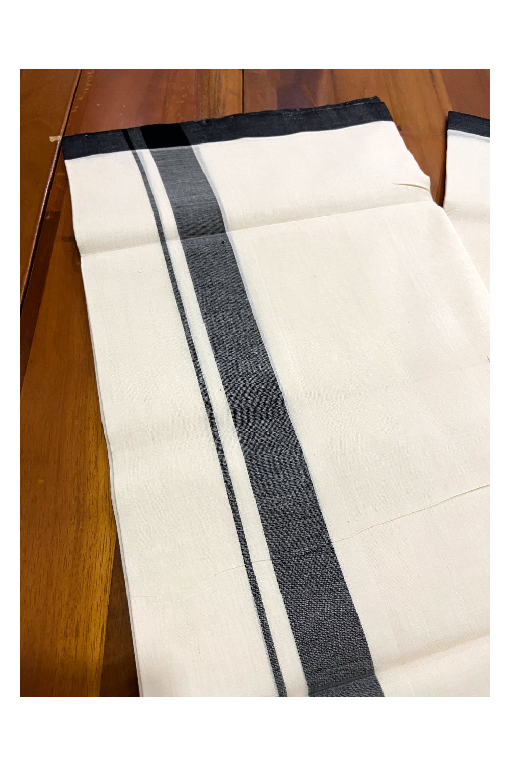 Southloom Premium Unakkupaavu Handloom Mundu with Black Border (South Indian Dhoti)