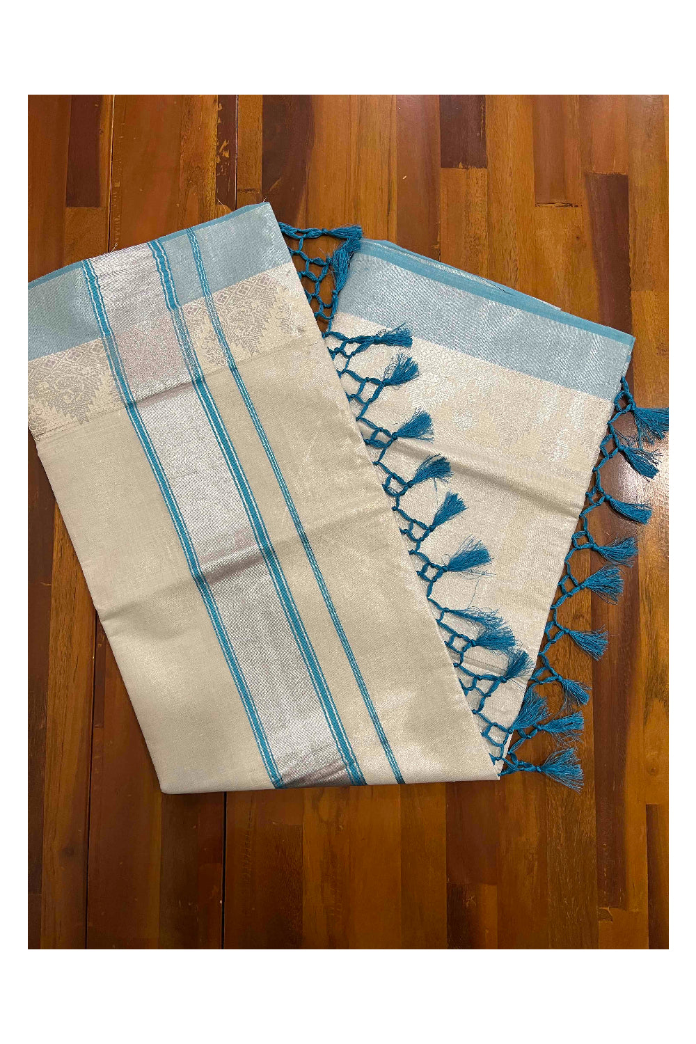 Kerala Silver Tissue Plain Saree with Sky Blue and Silver Border