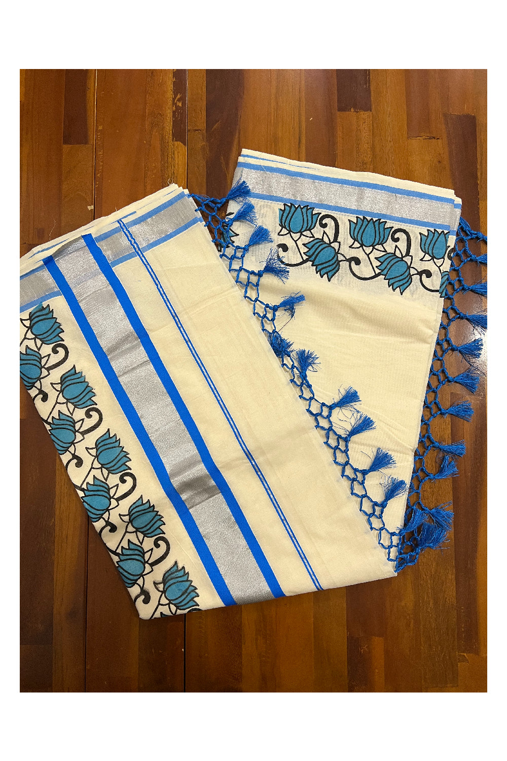 Pure Cotton Kerala Silver Kasavu and Light Blue Border Saree with Mural Floral Prints