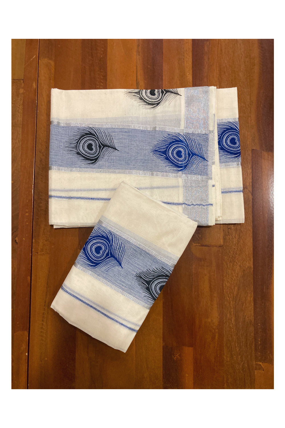 Kerala Cotton SIlver Kasavu Set Mundu (Mundum Neriyathum) with Blue and Black Feather Block Prints on Blue Border