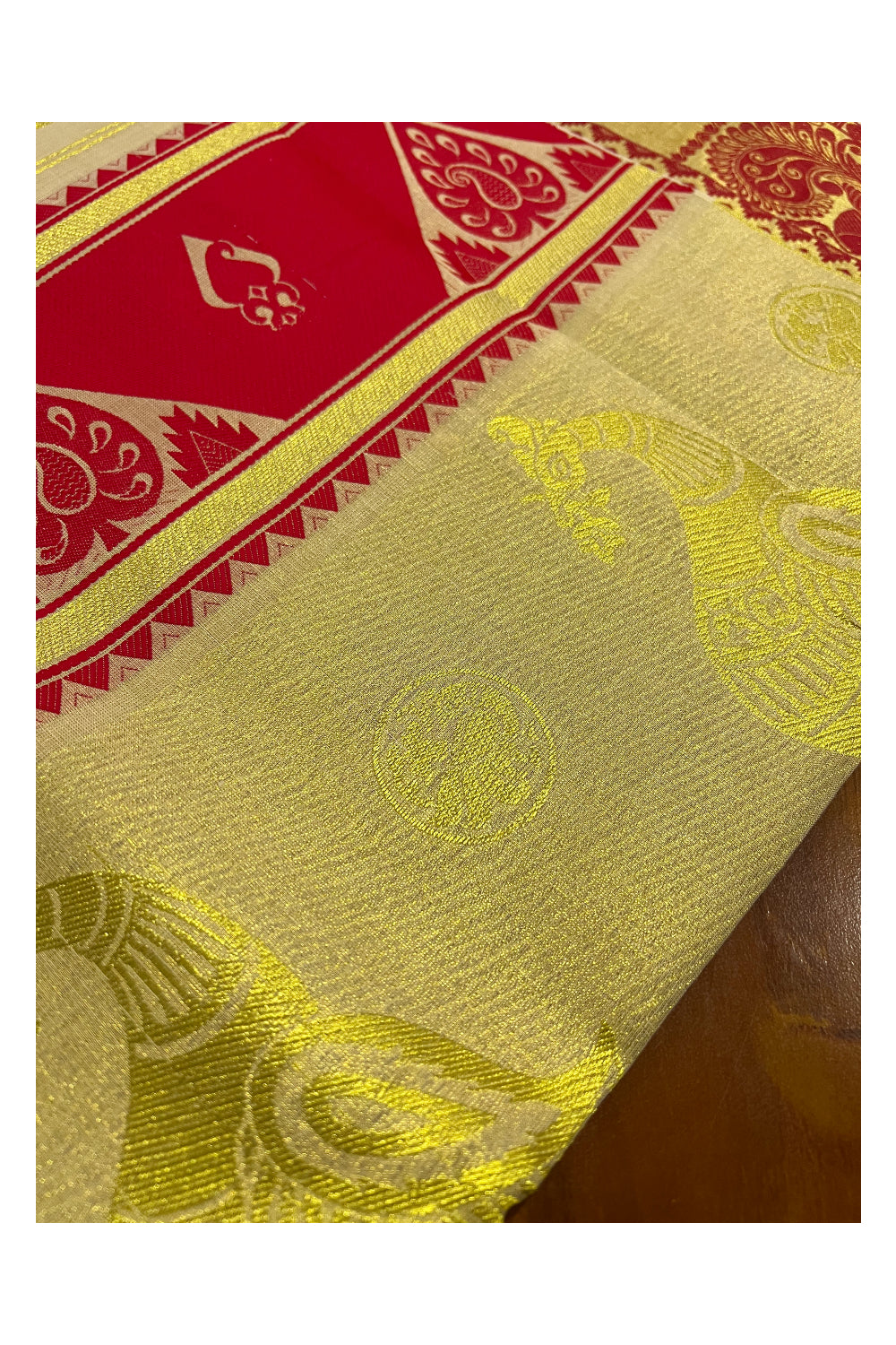 Kerala Tissue Kasavu and Red Heavy Woven Saree with Peacock Design