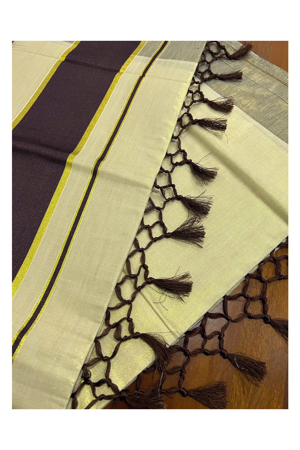 Kerala Kasavu Tissue Plain Saree with Dark Brown and Kasavu Border and Tassels Work on Pallu
