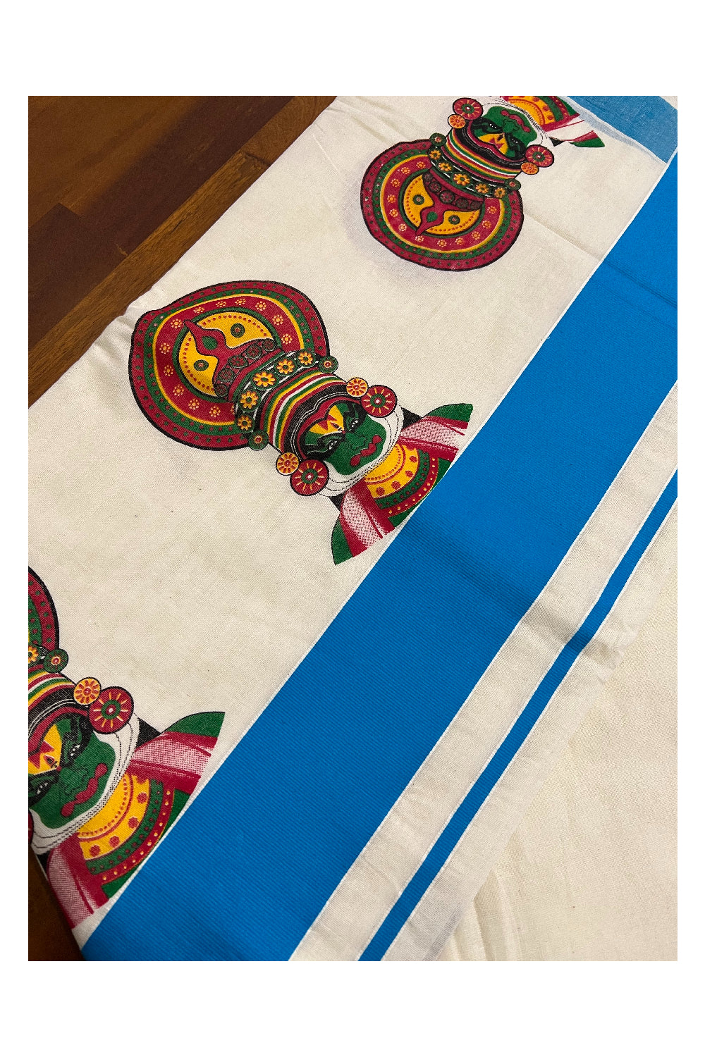 Kerala Pure Cotton Saree with Mural Printed Kathakali Face Design and Light Blue Border