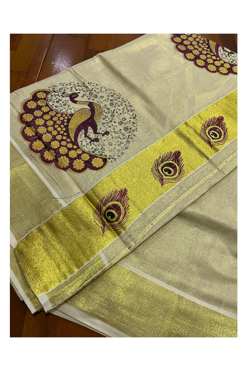 Kerala Tissue Kasavu Saree with Maroon Peacock Mural Printed Design