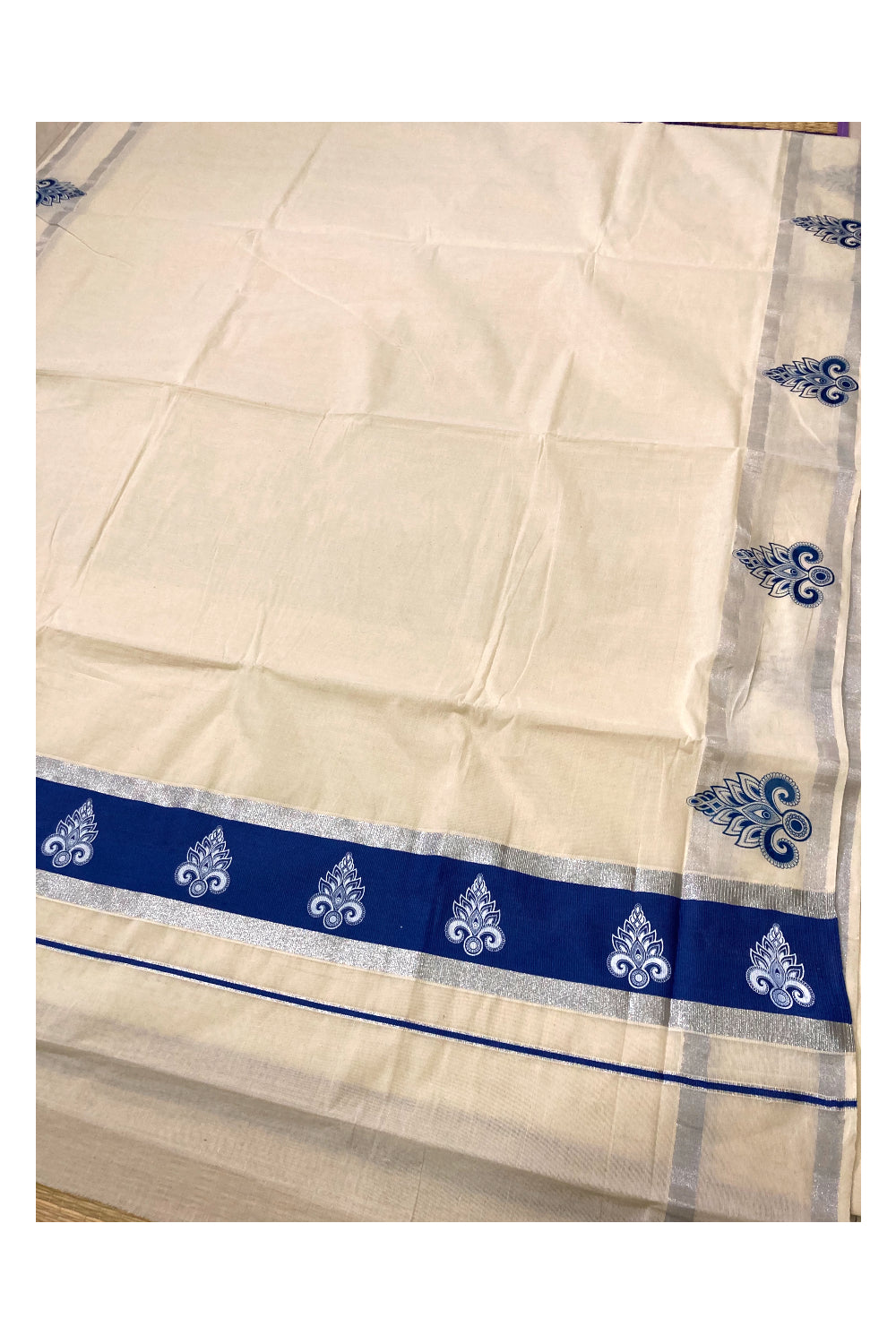 Pure Cotton Kerala Silver Kasavu Saree with White Block Prints in Blue Pallu