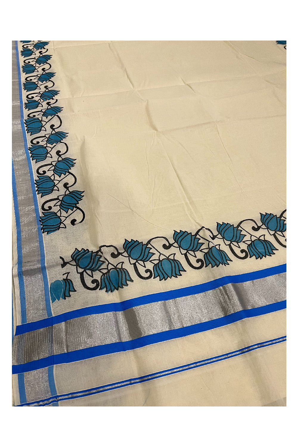 Pure Cotton Kerala Silver Kasavu and Light Blue Border Saree with Mural Floral Prints