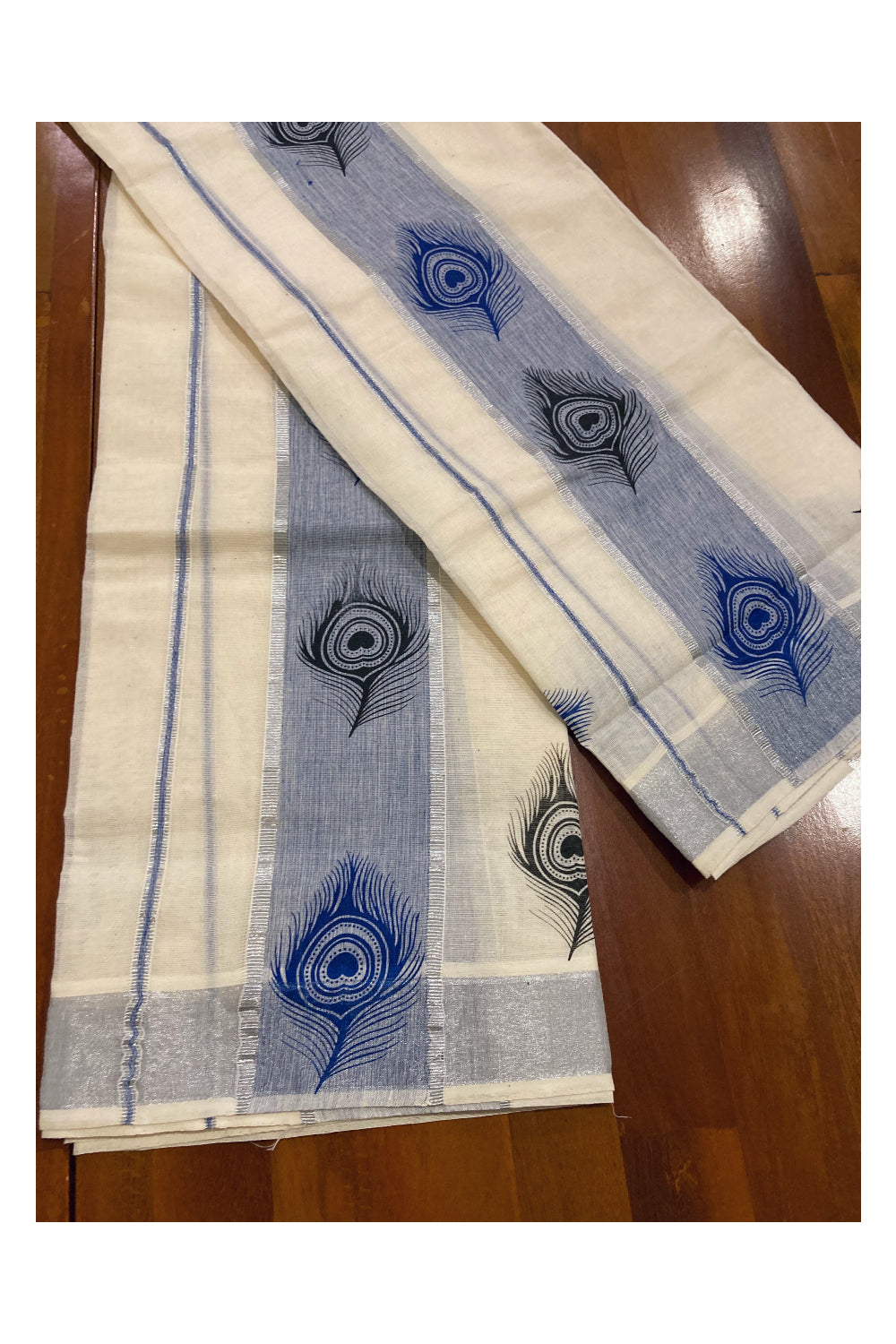 Kerala Cotton SIlver Kasavu Set Mundu (Mundum Neriyathum) with Blue and Black Feather Block Prints on Blue Border