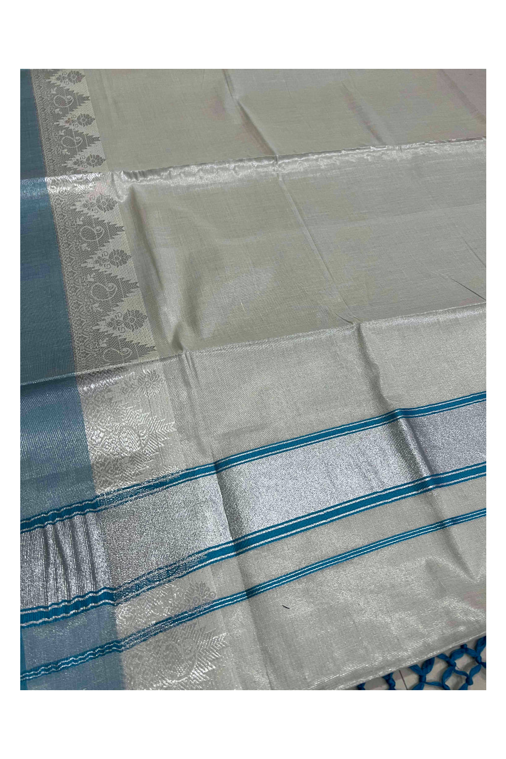 Kerala Silver Tissue Plain Saree with Sky Blue and Silver Border