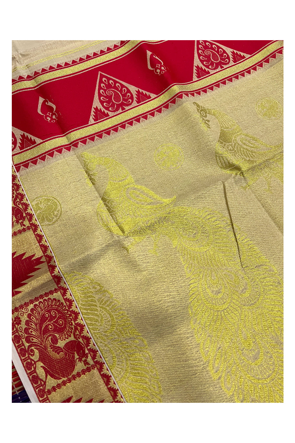 Kerala Tissue Kasavu and Red Heavy Woven Saree with Peacock Design