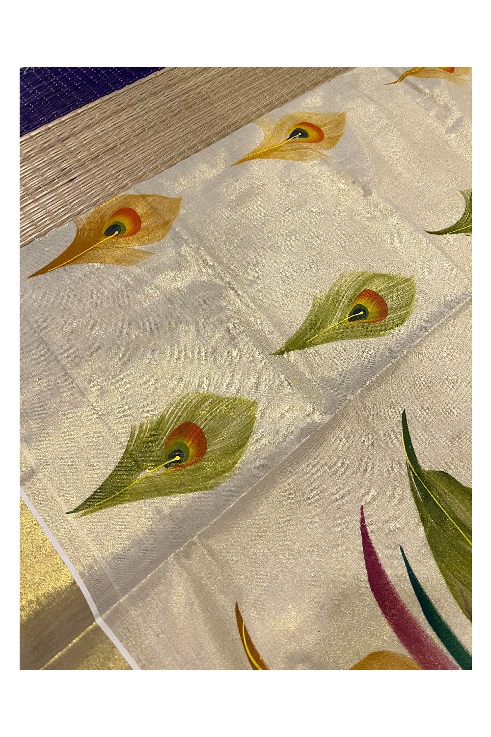 Kerala Tissue Kasavu Saree with Hand Painted Peacock Design