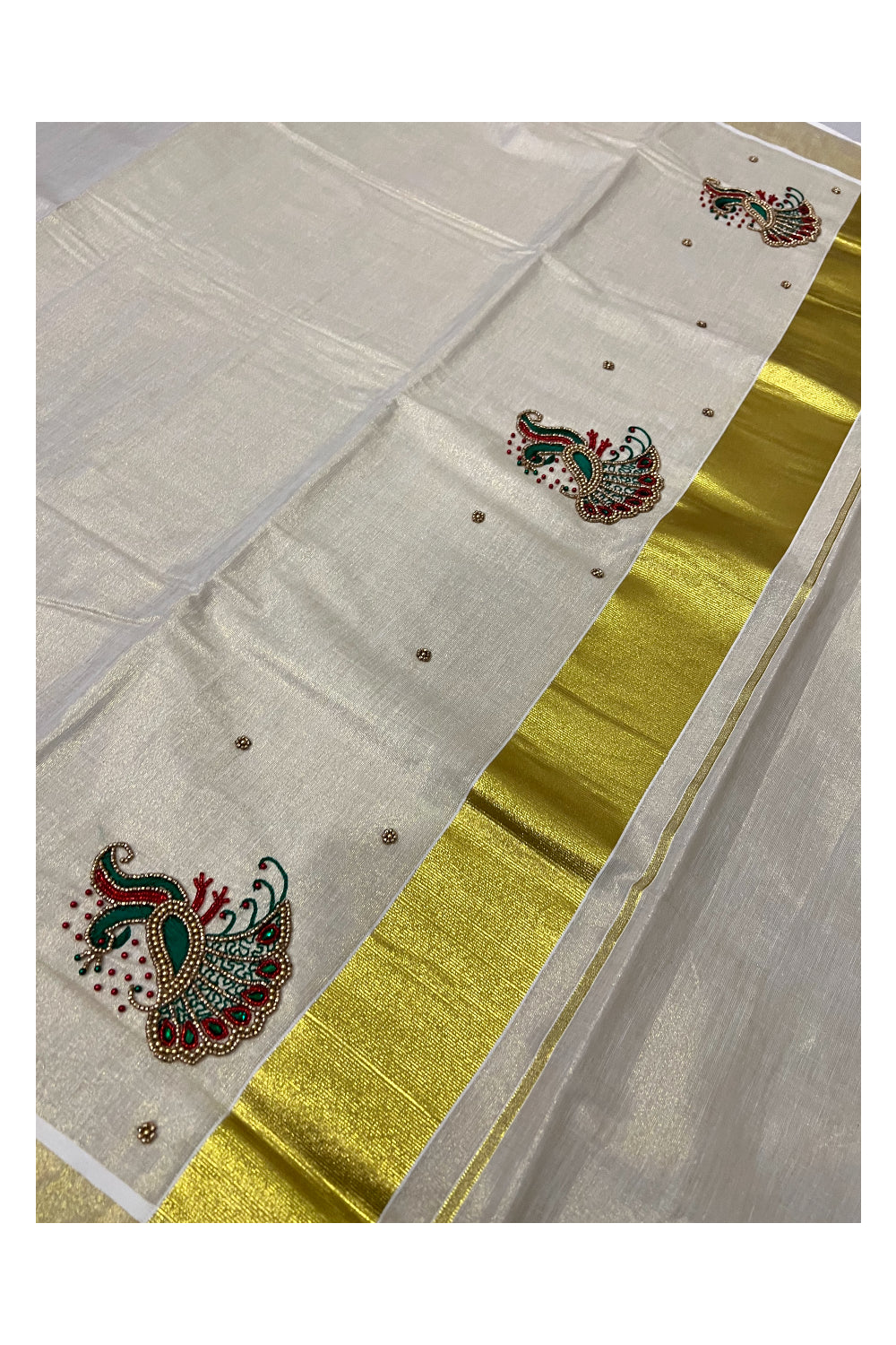 Kerala Tissue Kasavu Saree with Peacock Themed Bead Work Design and Green Blouse Piece