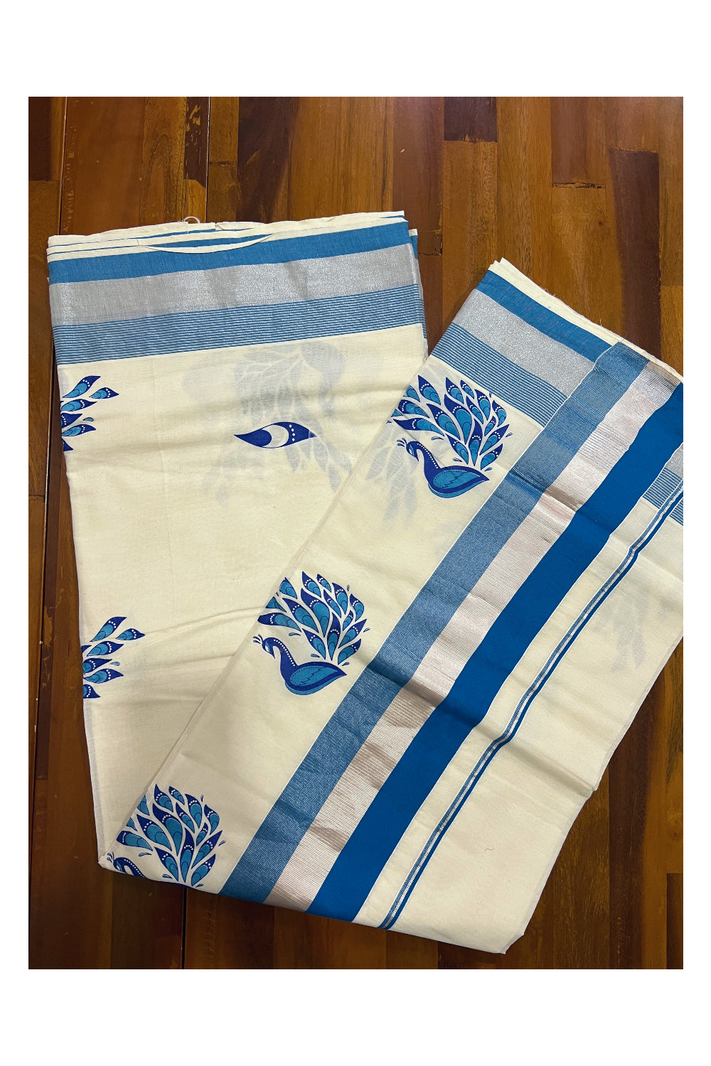 Kerala Pure Cotton Light Blue and Silver Kasavu Border Saree with Peacock Mural Printed Design