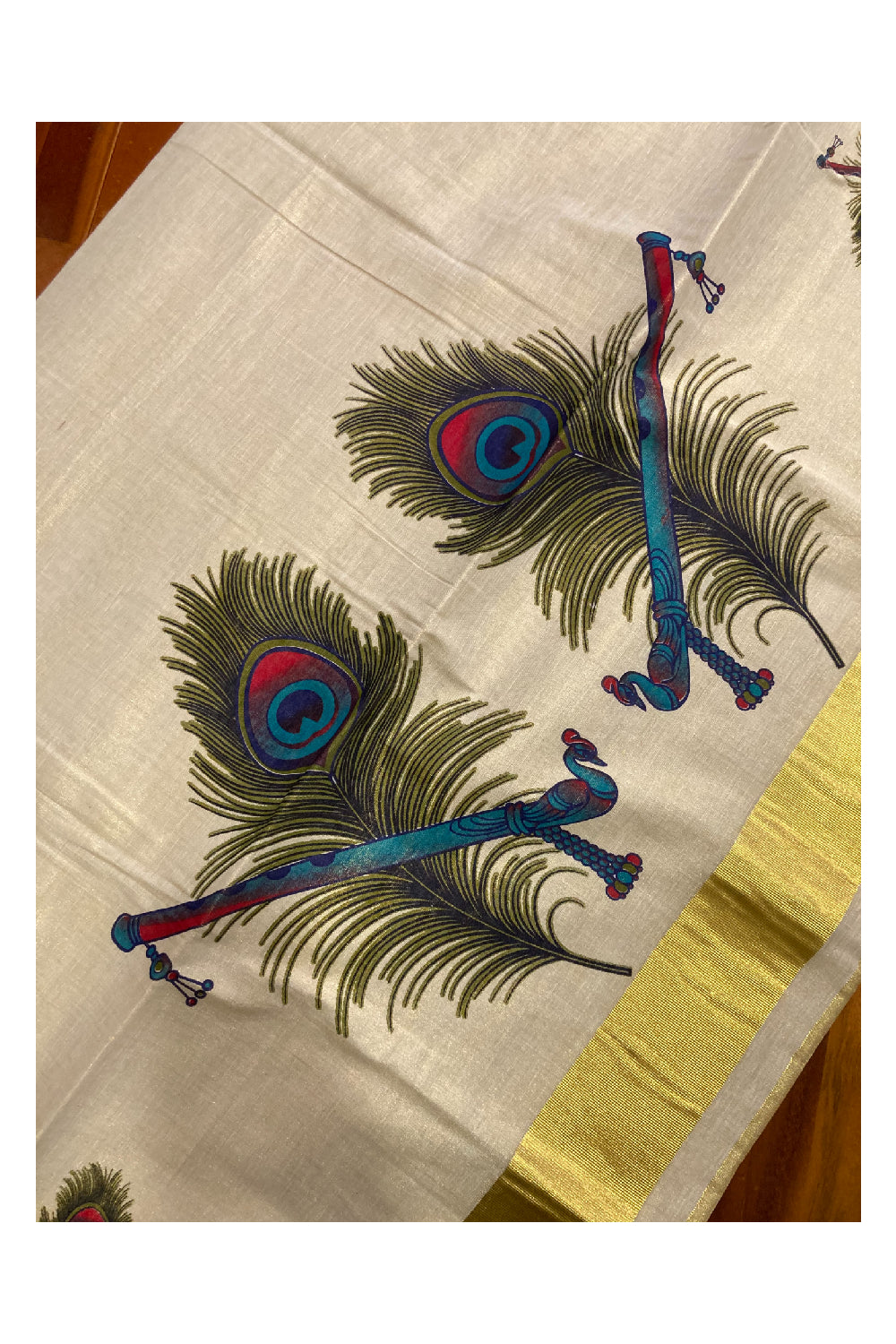 Kerala Tissue Kasavu Saree With Mural Peacock Feather Design