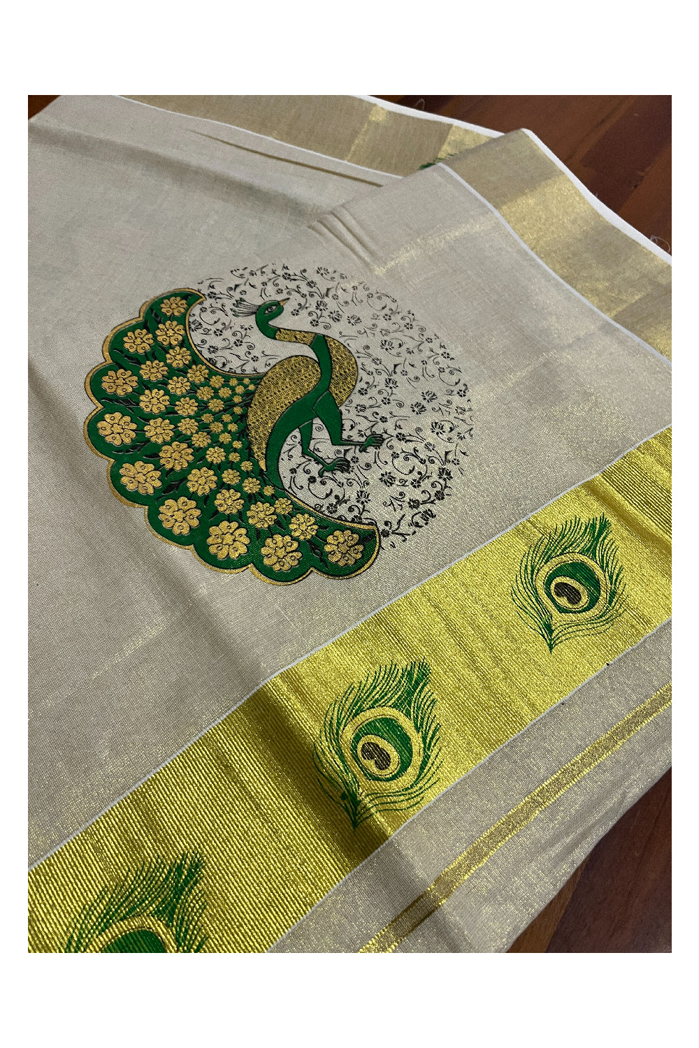 Kerala Tissue Kasavu Saree with Green Peacock Mural Printed Design