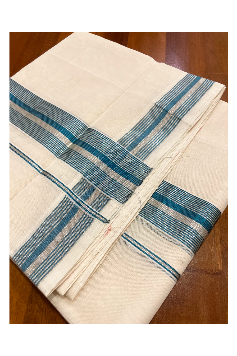 Southloom Premium Handloom Cotton Off White Mundu with Silver and Teal Blue Kasavu Border (South Indian Dhoti)