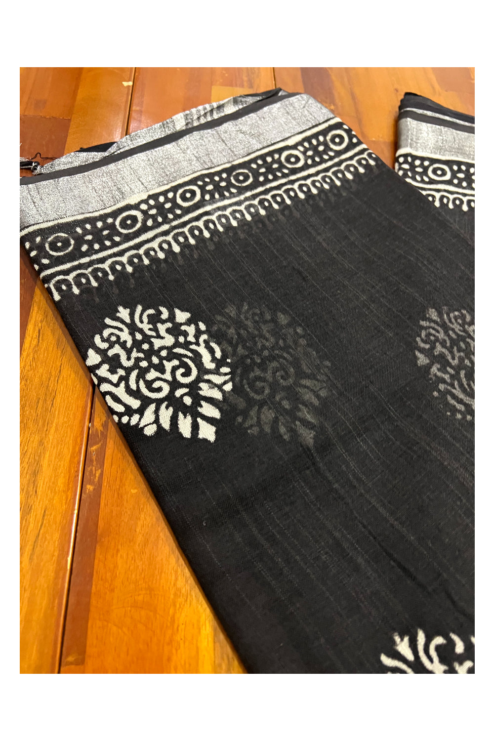 Southloom Linen Black Designer Saree with White Prints and Tassels on Pallu