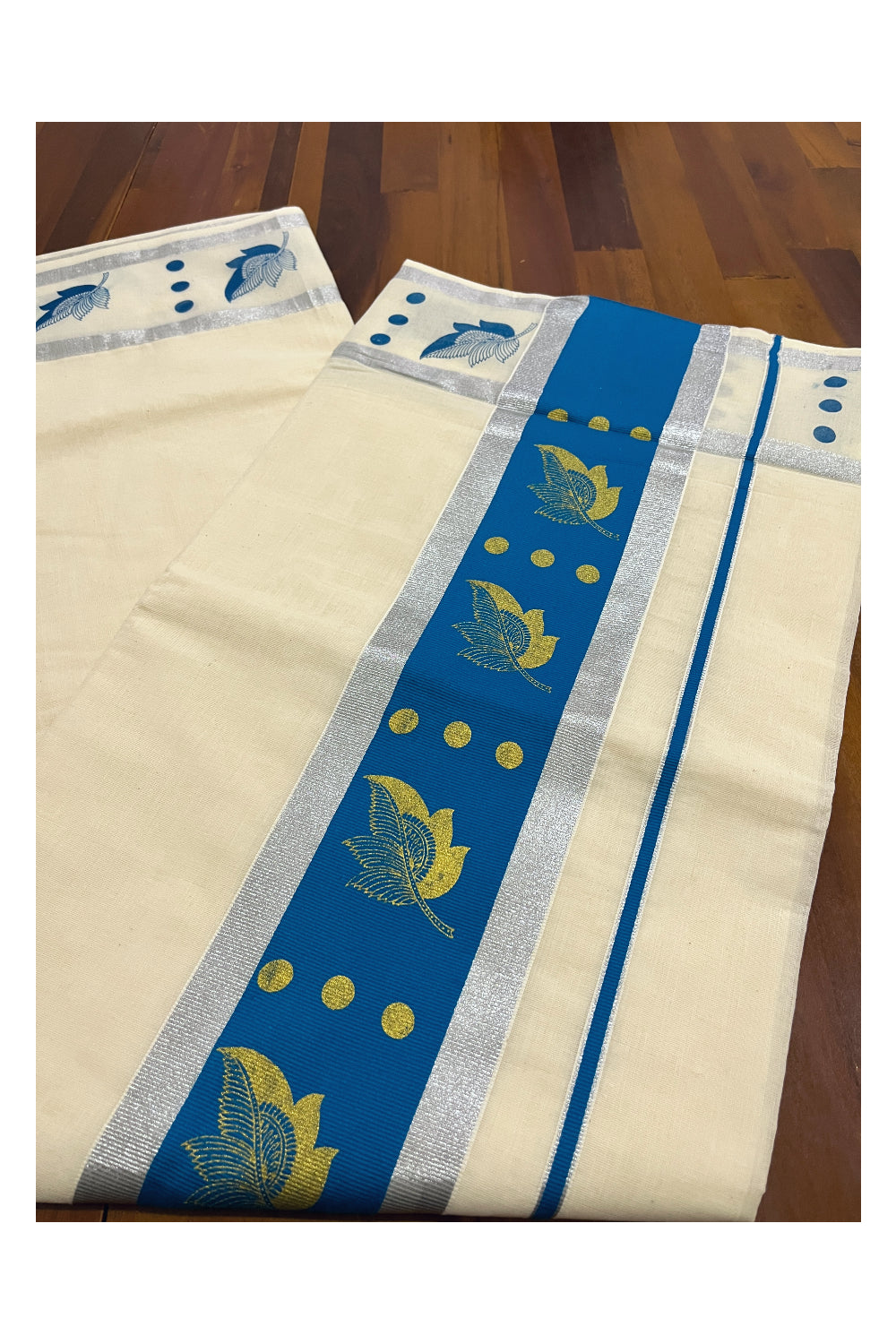 Pure Cotton Kerala Saree with Golden Leaf Block Prints on Silver Kasavu and Blue Pallu