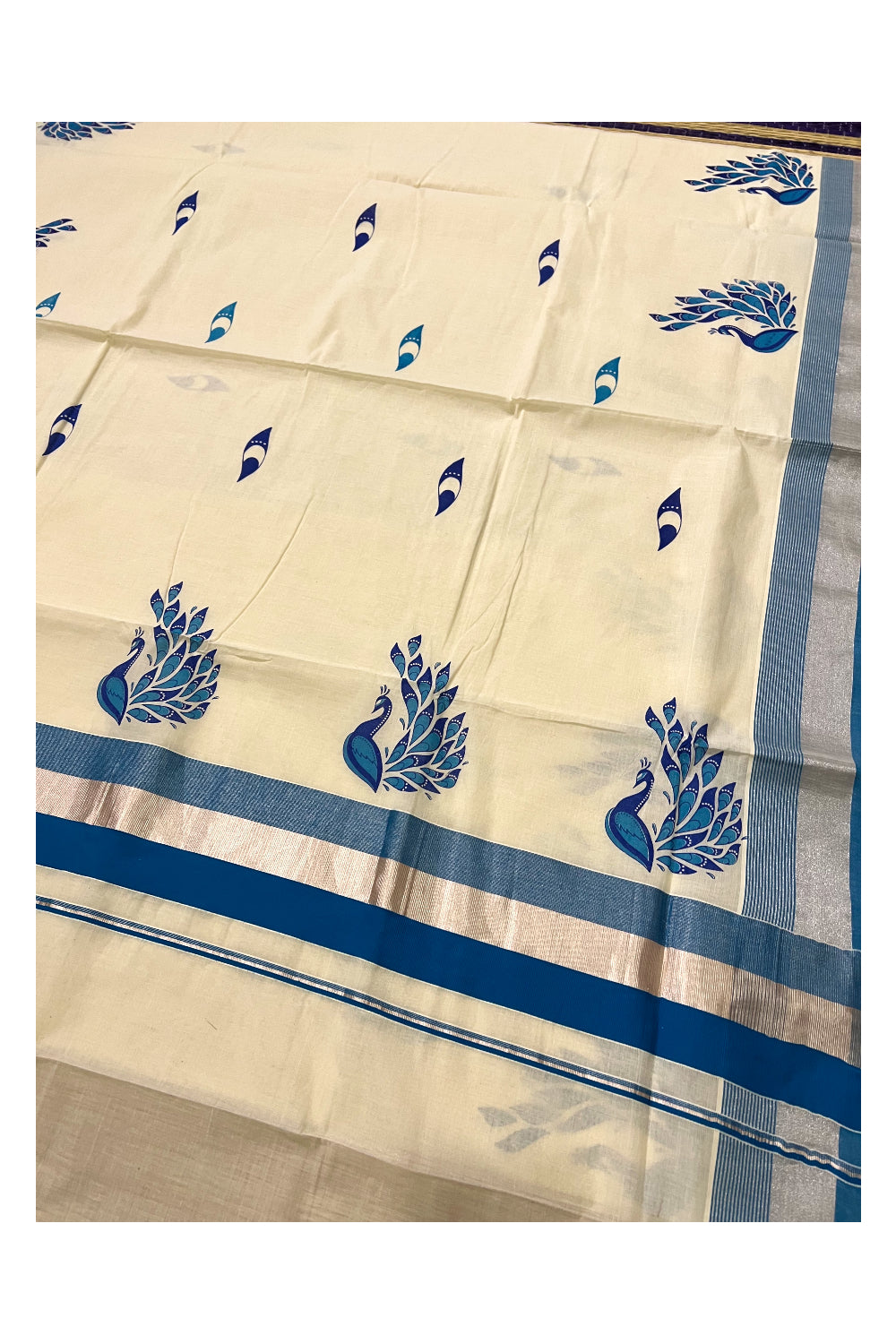 Kerala Pure Cotton Light Blue and Silver Kasavu Border Saree with Peacock Mural Printed Design