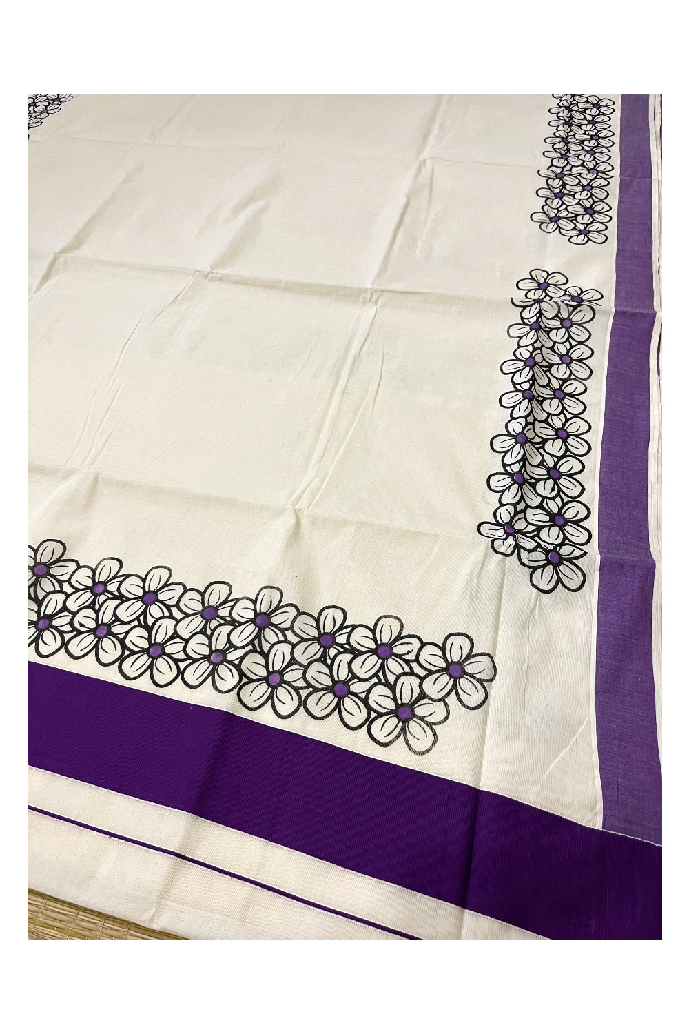 Pure Cotton Kerala Saree with Black Floral Block Prints and Violet Border