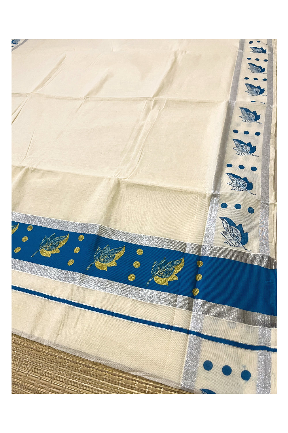 Pure Cotton Kerala Saree with Golden Leaf Block Prints on Silver Kasavu and Blue Pallu