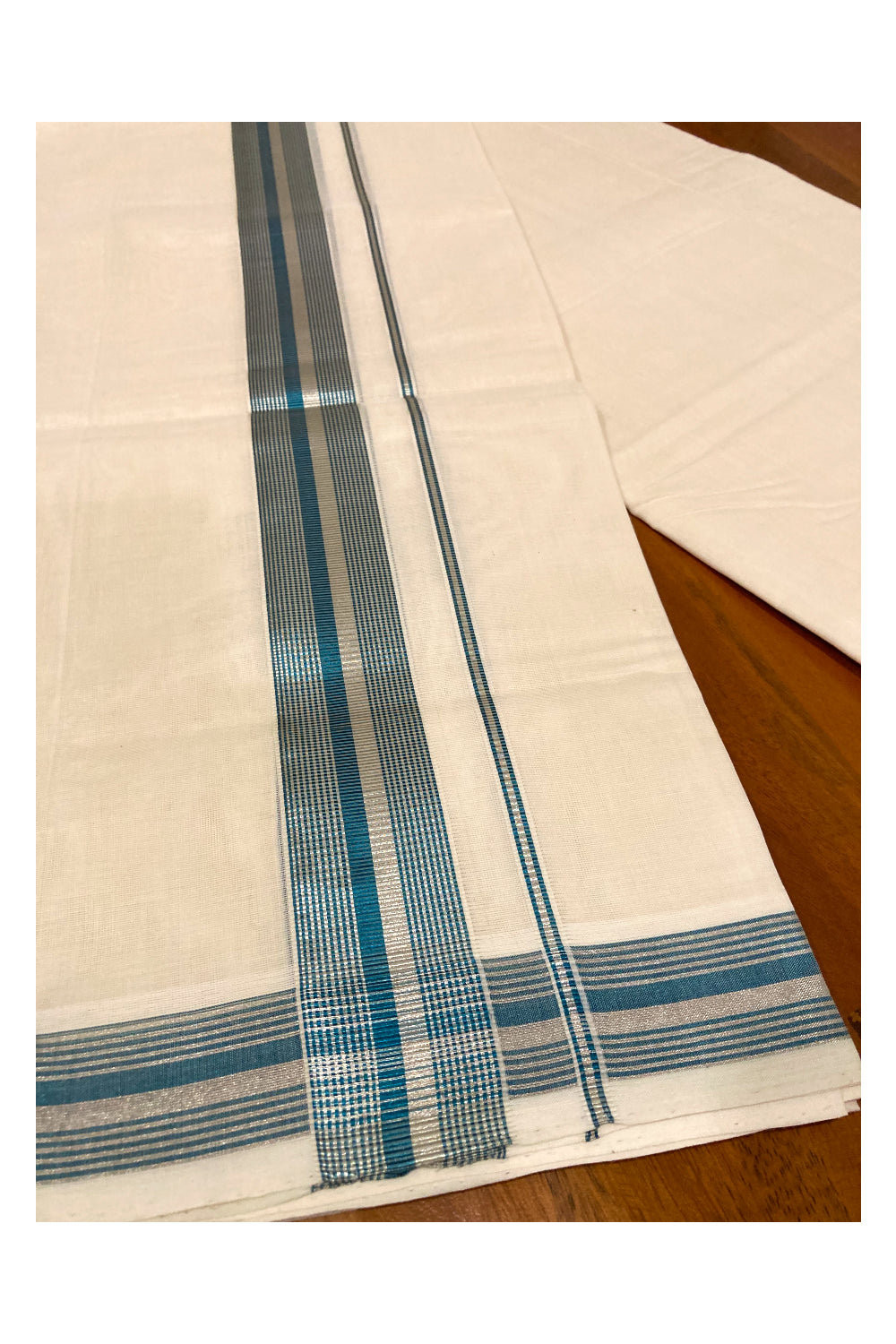 Southloom Premium Handloom Cotton Off White Mundu with Silver and Teal Blue Kasavu Border (South Indian Dhoti)