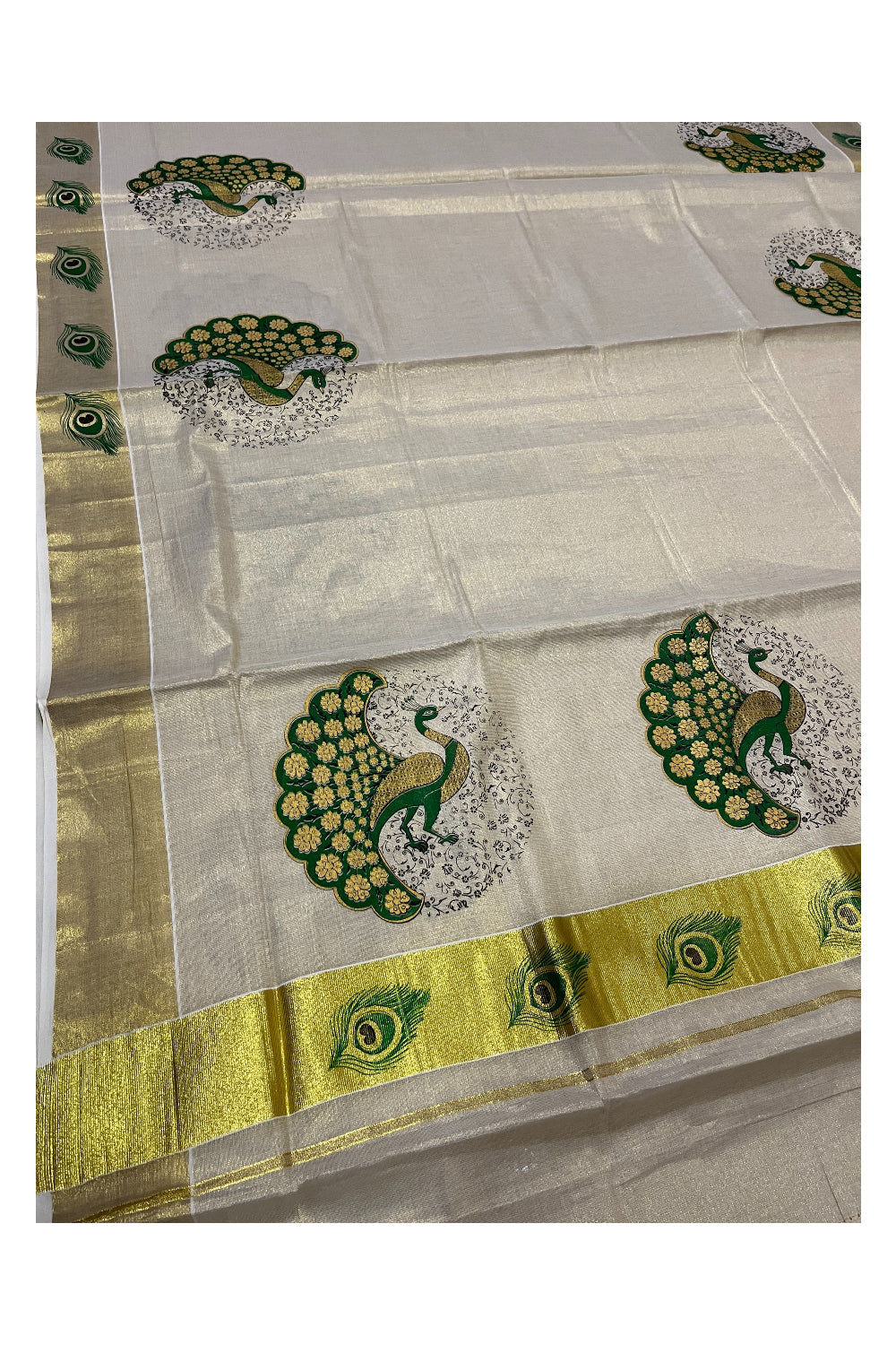 Kerala Tissue Kasavu Saree with Green Peacock Mural Printed Design