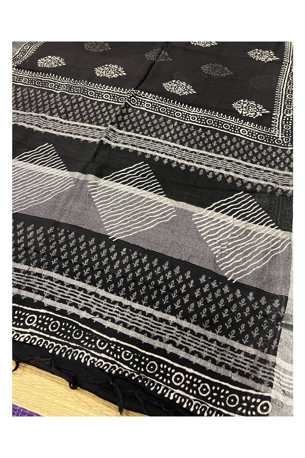 Southloom Linen Black Designer Saree with White Prints and Tassels on Pallu