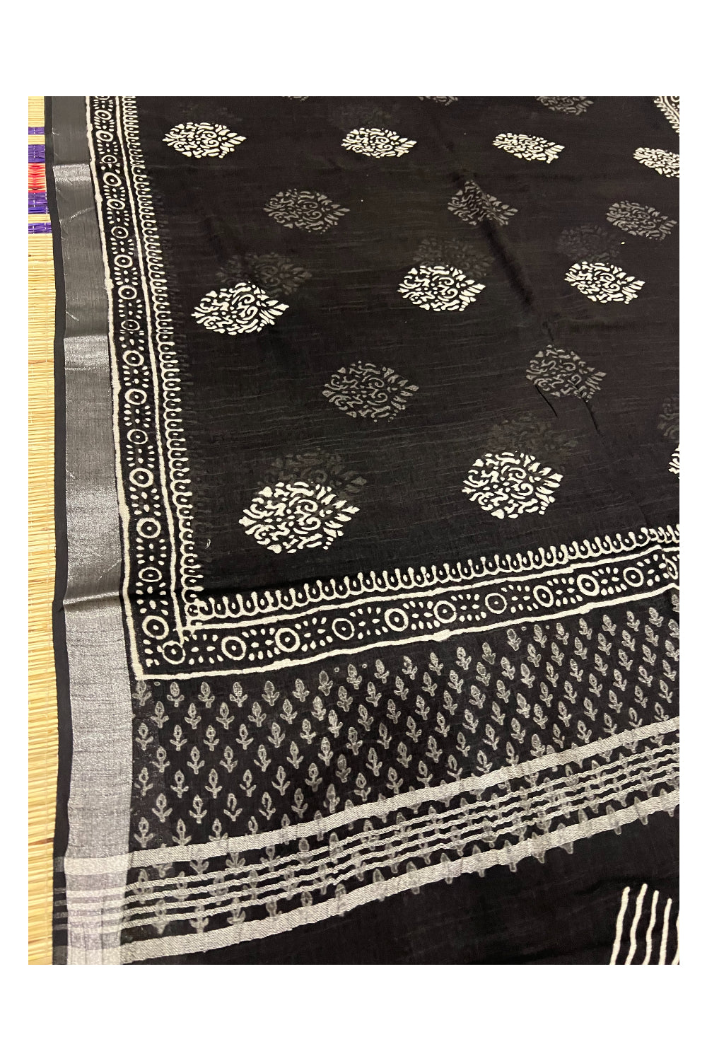 Southloom Linen Black Designer Saree with White Prints and Tassels on Pallu