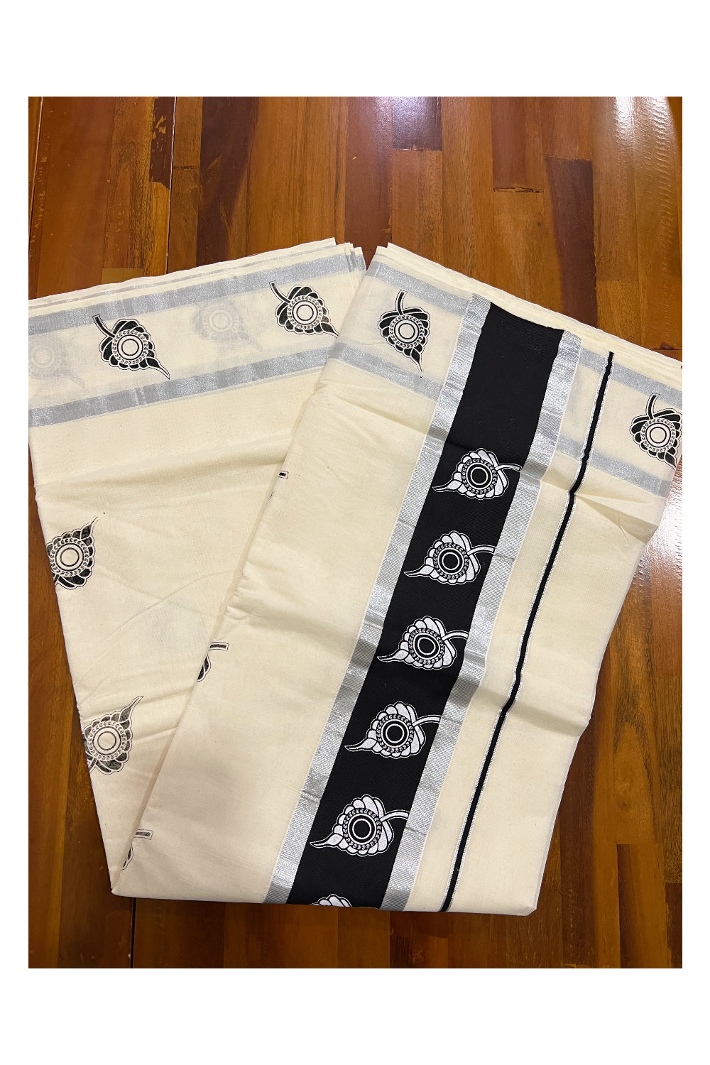 Pure Cotton Kerala Silver Kasavu Saree with White Leaf Block Printed Design in Black Pallu