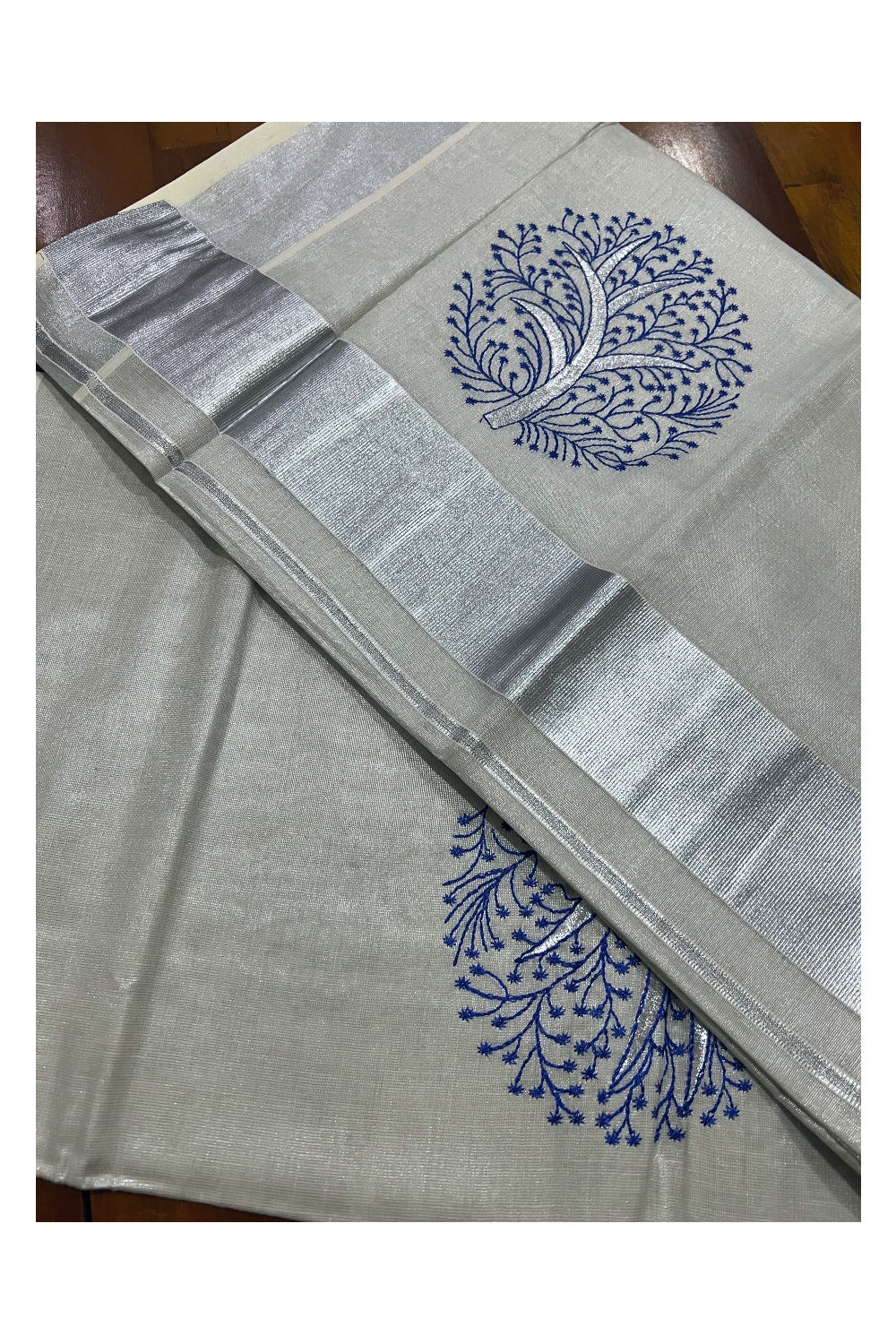 Kerala Silver Tissue Kasavu Saree with Blue Floral Thread works