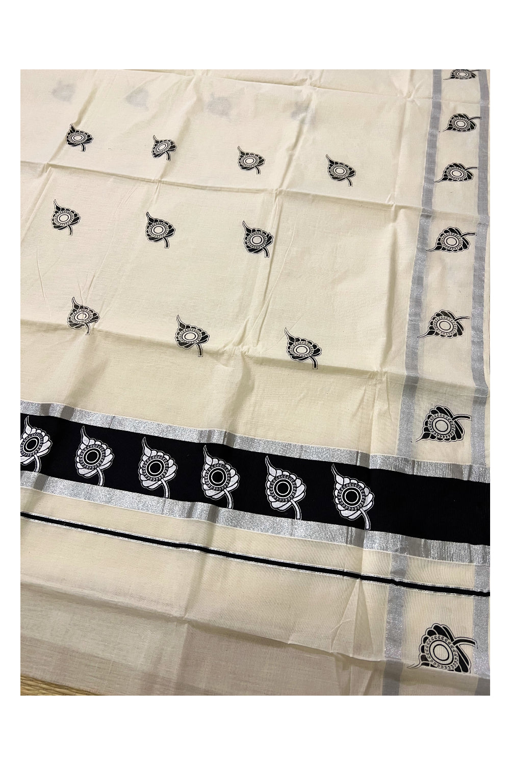 Pure Cotton Kerala Silver Kasavu Saree with White Leaf Block Printed Design in Black Pallu