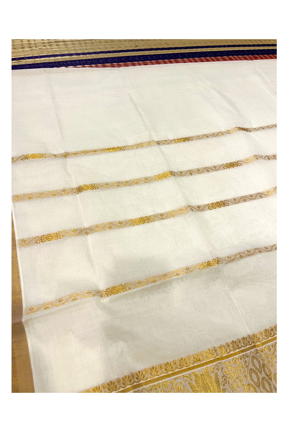 Pure Cotton Kerala Kasavu Heavy Work Saree with Floral Woven Design